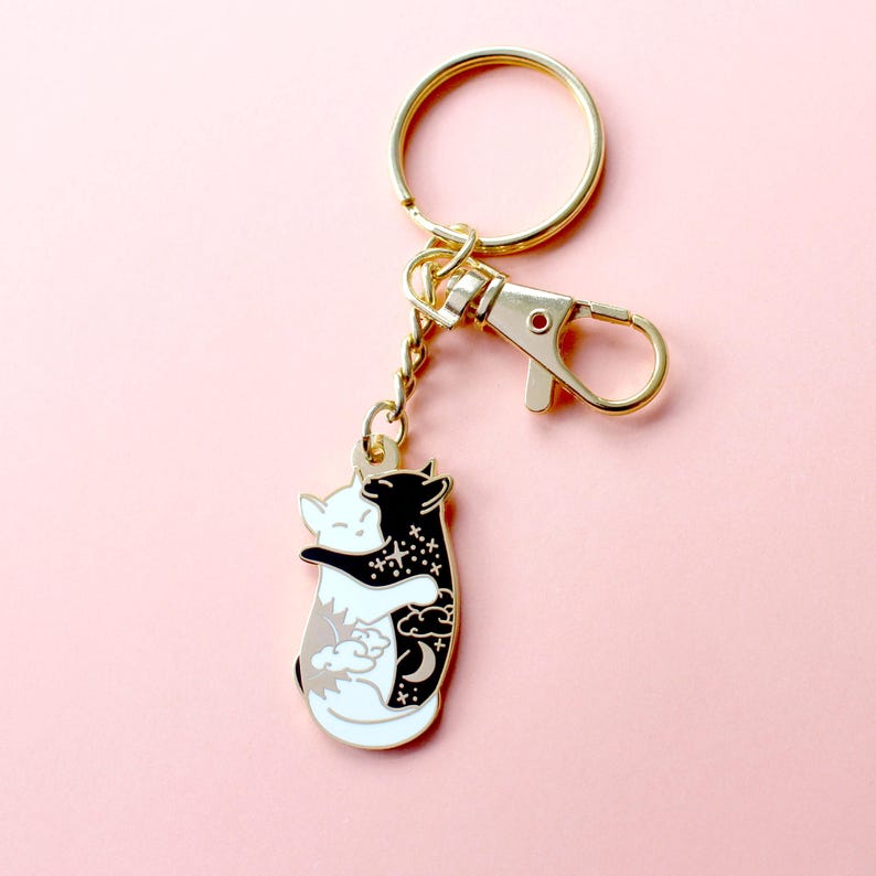 Day & night hugging cats keychain image 2