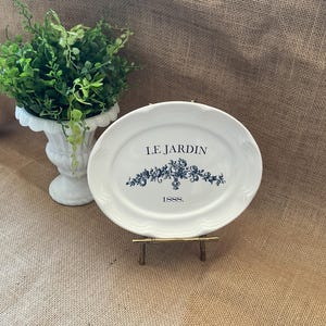 Vintage whiteoval ironstone plate with French transfer