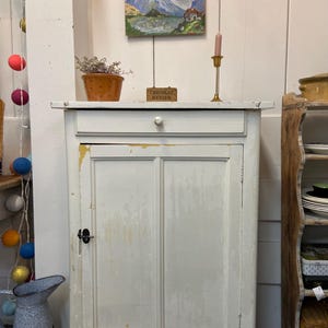 Beautiful vintage rustic French  farmhouse cabinet, buffet with it’s original old white paint