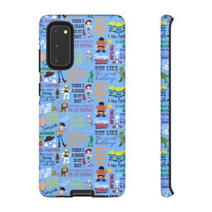May include: A light blue phone case with a repeating pattern of Toy Story characters and quotes. The design includes Woody, Buzz Lightyear, and other characters from the animated film. The case also has a black camera cutout.