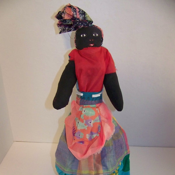 ジャマイカのカラフルな手作りの黒い縫いぐるみ人形