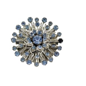 Vintage Starburst Silver tone and blue rhinestone Brooch
