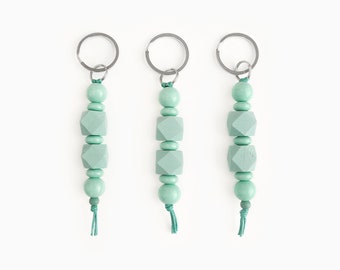 Schlüsselanhänger aus Holzperlen in Mint | Türkiser Schlüsselring für Haustür- oder Autoschlüssel | Kleine Geschenke zur neuen Wohnung