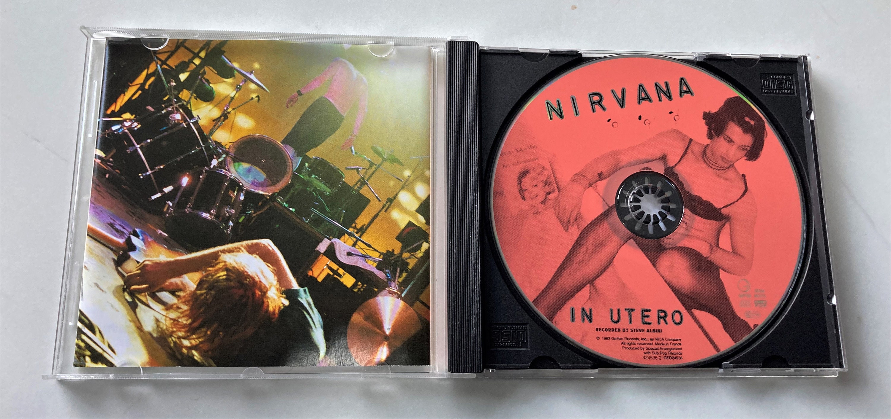 Help with identifying this In Utero CD? Is the heart hole punch anything  significant? : r/Nirvana