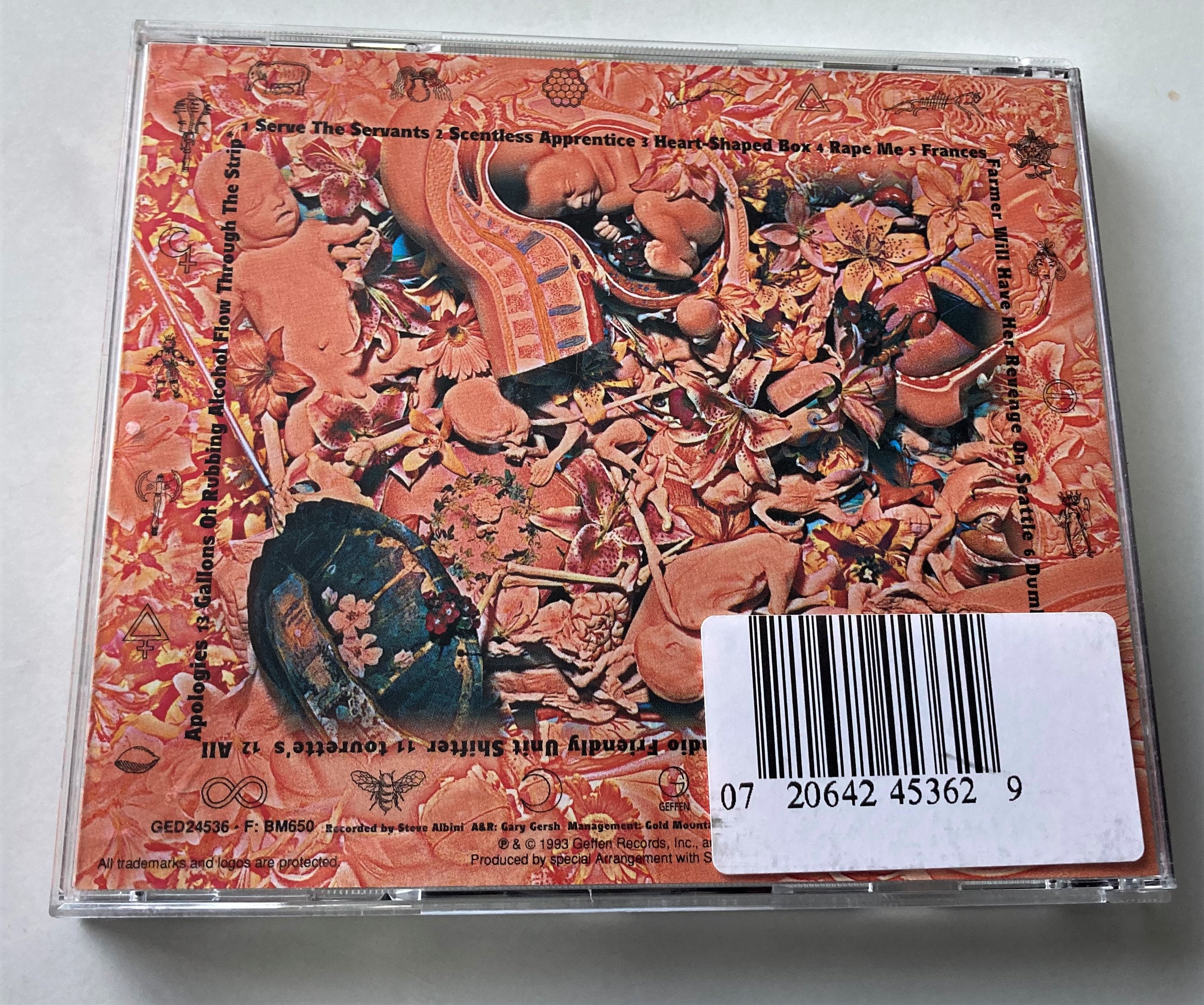 Help with identifying this In Utero CD? Is the heart hole punch anything  significant? : r/Nirvana