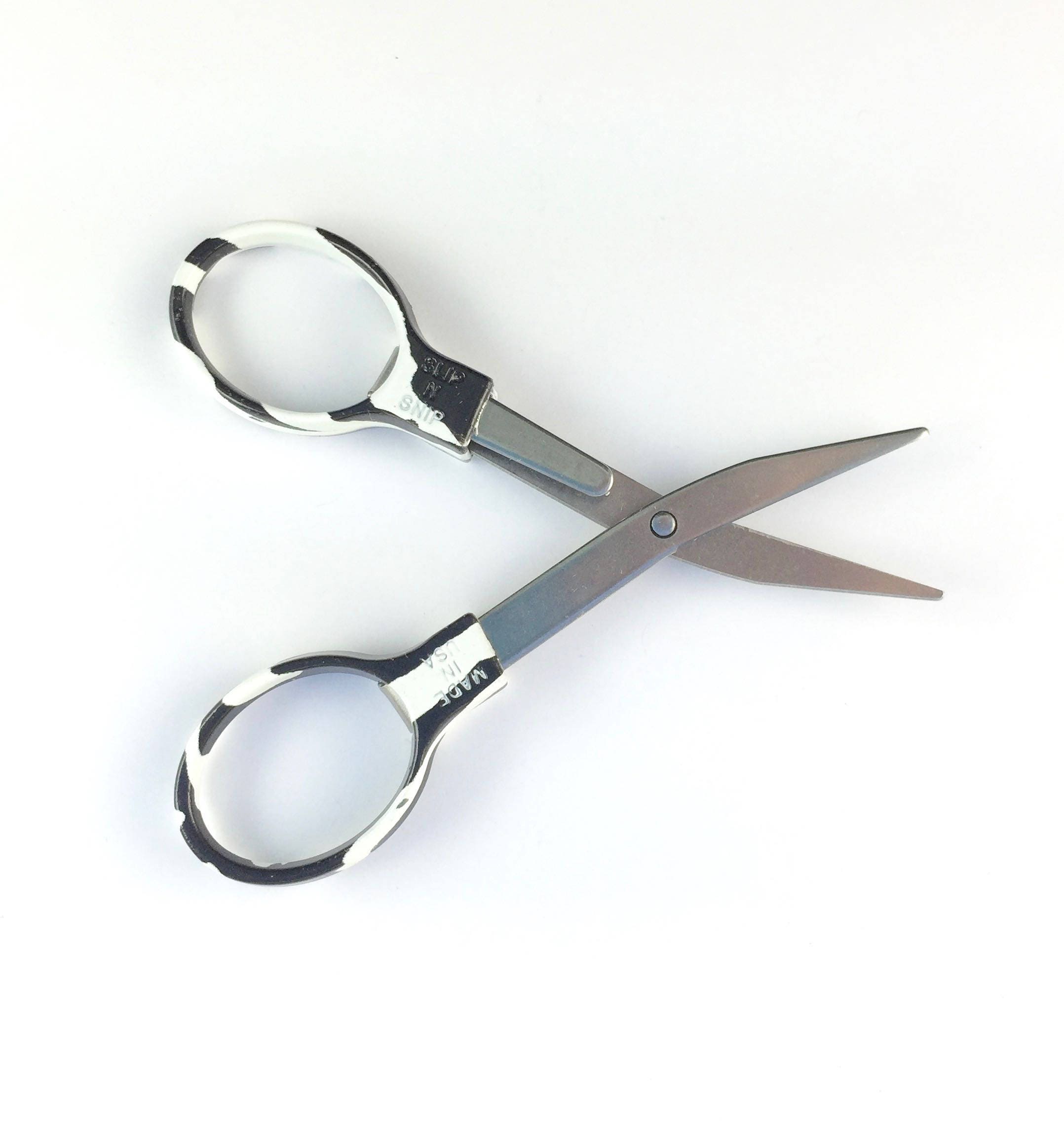Slip-N-Snip Folding Scissors Regular stainless scissors.