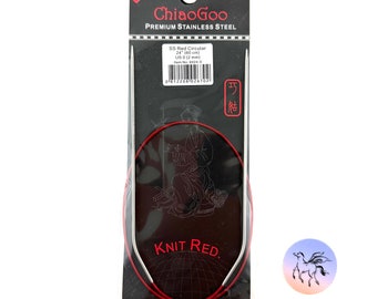May include: A red and silver circular knitting needle set by ChiaoGoo. The needles are 24 inches (60 cm) long and are size US 0 (2 mm). The packaging features the brand name, size, and item number. The needles are made of premium stainless steel.
