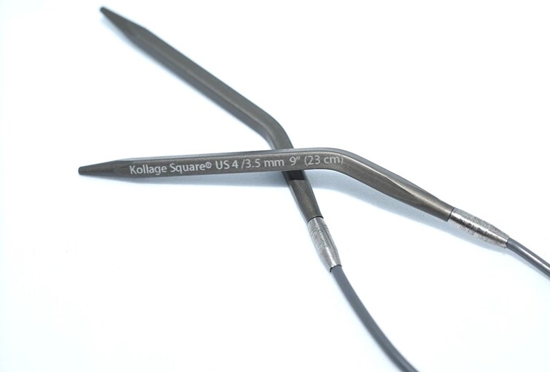 May include: A pair of gray metal knitting needles with a black cable. The needles are 9 inches (23 cm) long and are size US 4/3.5 mm. The needles are labeled "Kollage Square&reg; US 4/3.5 mm 9" (23 cm)"