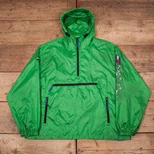 May include: A green hooded jacket with a zip fastening and two pockets. The jacket has a logo on the sleeve.
