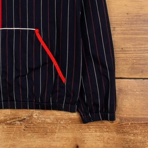 Chaqueta deportiva vintage Fila para mujer, años 90, azul, con raya diplomática y cremallera 1/4 imagen 7