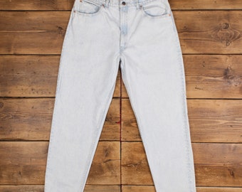 Jean Levis 550 vintage 36 x 31 USA fabriqué des années 90 délavé à l'acide conique blanc rouge