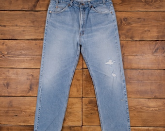 Jean Levis 505 vintage 36 x 30 USA fabriqué des années 90 délavé à la pierre bleu denim droit