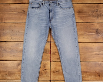 Jeans Levi's 502, taglia 38x30, blu, vestibilità regolare, affusolata, in denim slavato chiaro.
