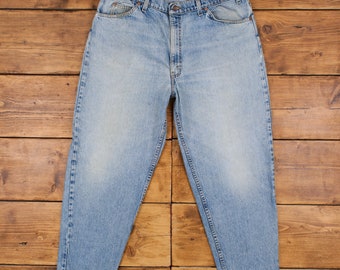 Vintage Levis 560 Jeans 38 x 29 USA Made 90s Stonewash Tapered Blue Orange Tab