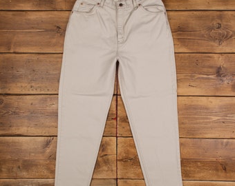 May include: A pair of light beige high-waisted jeans with a straight leg.