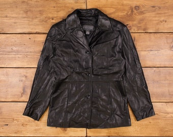 May include: A black leather jacket with a button closure and a collar. The jacket has a slightly fitted silhouette.