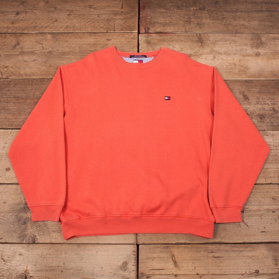 orange tommy jumper