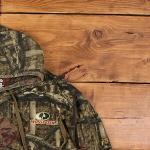 Felpa con cappuccio Mossy Oak taglia L da uomo, con logo mimetico, ideale per attività all'aperto e caccia, colore marrone. immagine 5