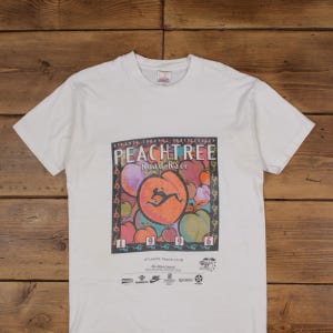 Vintage Fruit of the Loom Graphic T Shirt Medium 90s USA Made Running White