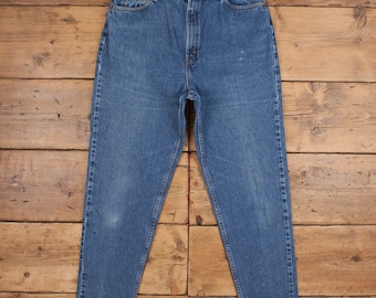 Vintage Levis 560 Jeans 34 x 31 Stonewash Tapered Blue Red Tab Denim
