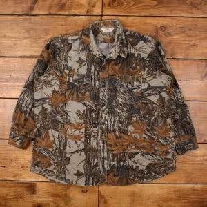 Camisa de franela con botones Redhead Chamois, talla 2XL, para hombre, estampado de camuflaje Real Tree para exteriores, color marrón.