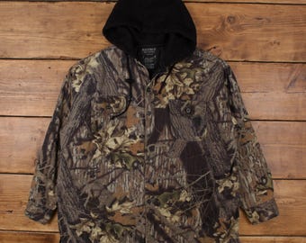 Chaqueta de exterior vintage H.S. Strut talla L, color roble musgo, con capucha y camuflaje