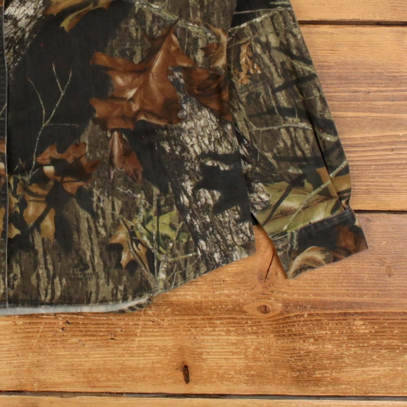 Camisa de camuflaje Mossy Oak Real Tree, talla XL para mujer, con botones y bolsillo, ideal para caza y actividades al aire libre, color verde. imagen 8