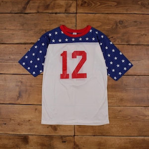 May include: White mesh jersey with blue and white star patterned sleeves. The jersey has a red number "12" on the front.