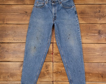 Vintage Levis Jeans 33 x 32 USA fabriqué des années 90 délavé à la pierre fuselé bleu rouge onglet denim