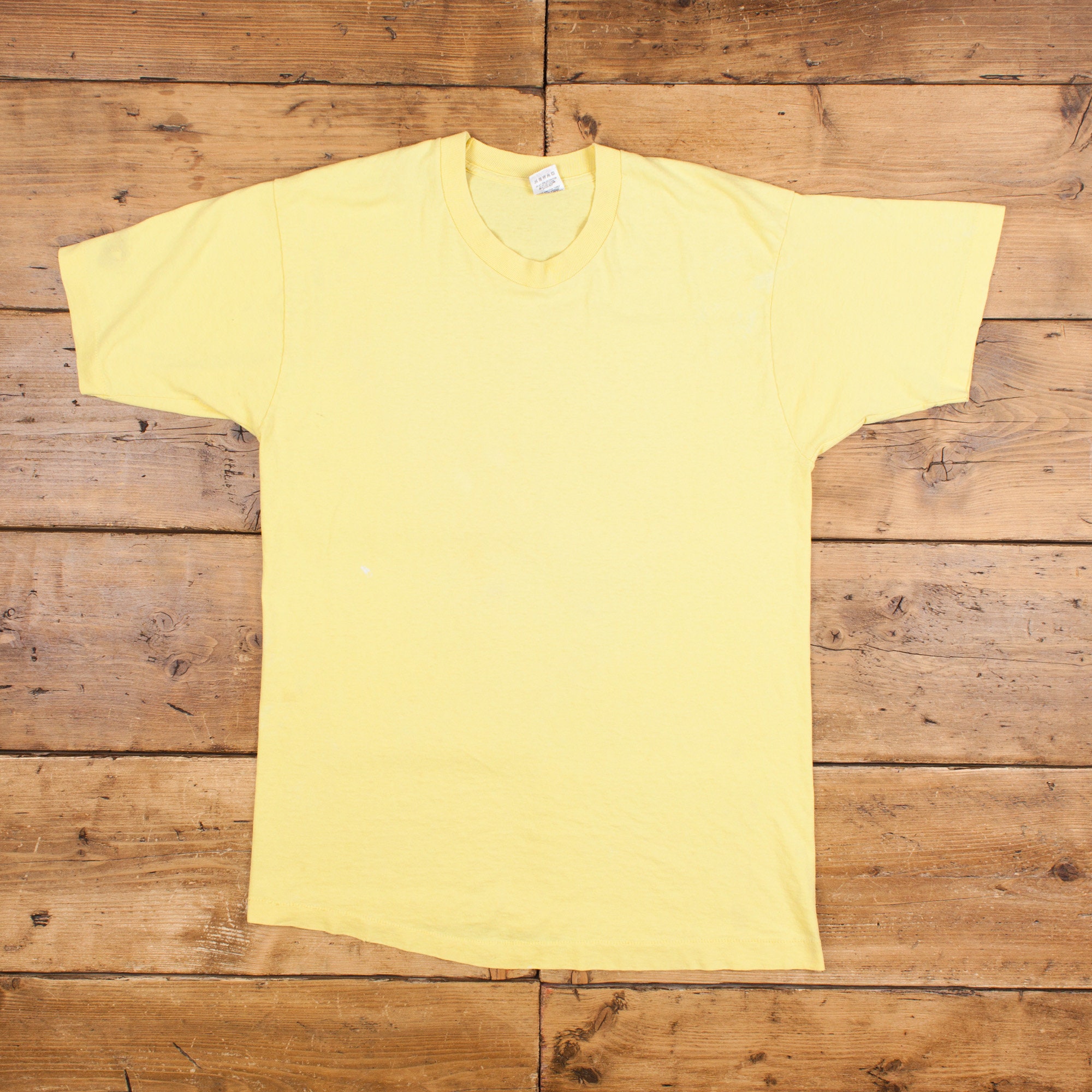 Pale yellow t shirt hotsell
