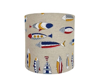 Wall lamp with beige fabric and blue yellow goldfish for seaside decoration