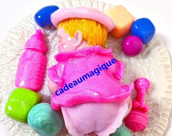 Sleeping baby girl on fimo play mat: party deco