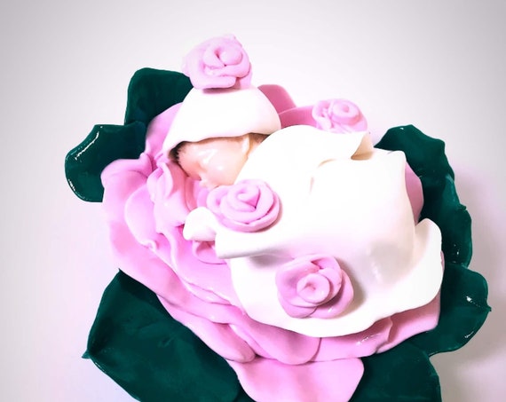 Adorable sleeping baby in a pink fimo baby gift decoration