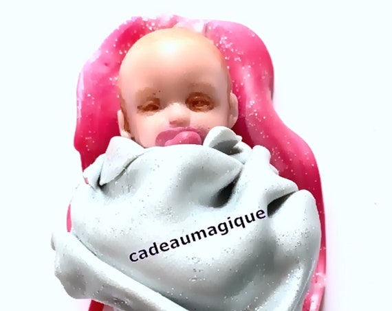 Adorable newborn on fushia cushion in fimo: pregnancy announcement
