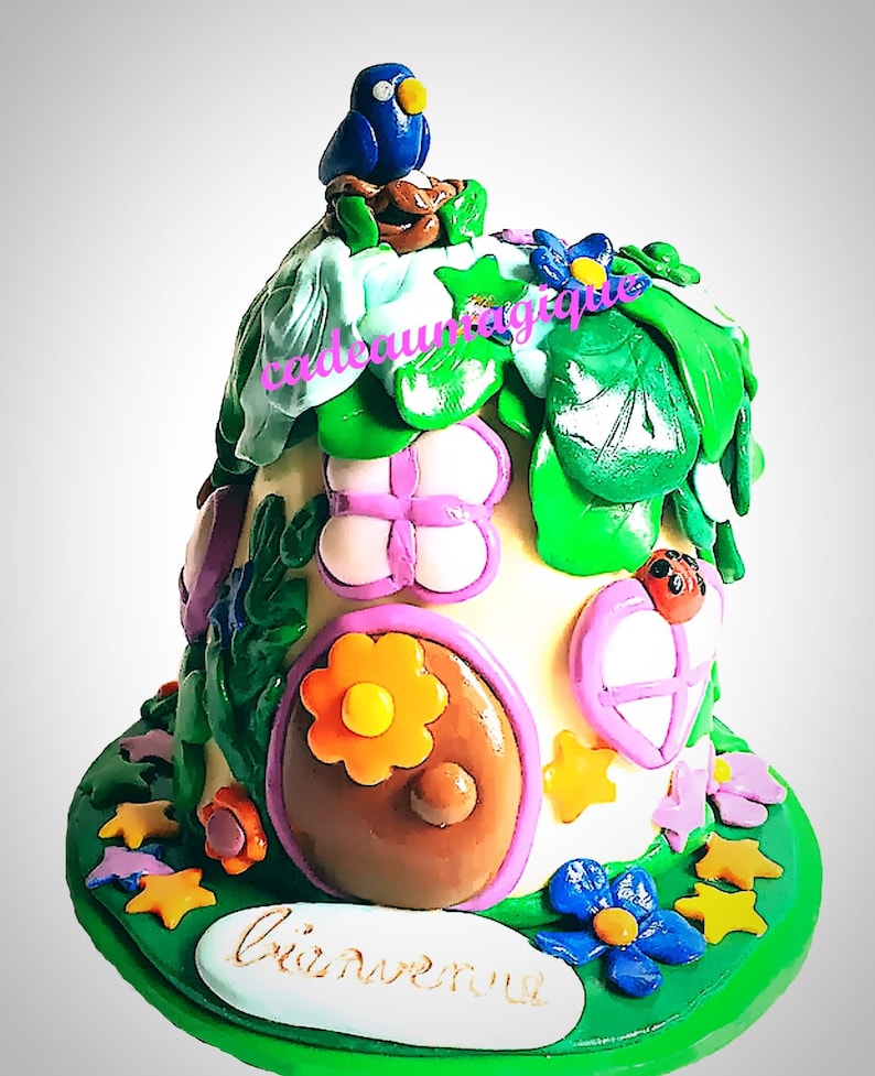 Piggy bank - hobbit house in fimo: enchanted forest décor Piggy bank - hobbit house in fimo: enchanted forest décor