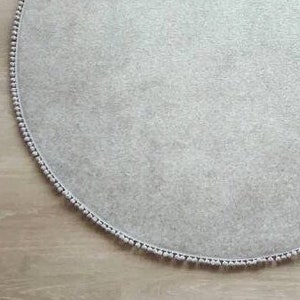 Wollfilz Teppich. Teppichwolle. Moderner Wollteppich.