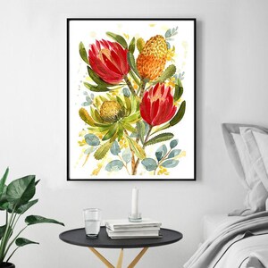 May include: Watercolor painting of a bouquet of red and yellow Banksia flowers with green leaves on a white background.