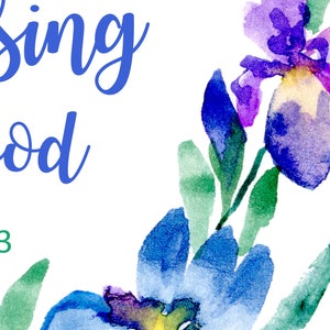 May include: Watercolor painting of blue and purple iris flowers with green leaves. The text "Sing God 18:3" is written in blue on a white background.