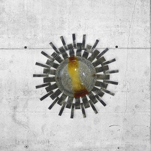 Vintage brutalist sun wall lamp