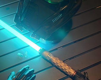 Accesorio para sable de luz Prax: réplica impresa en 3D y acabada a mano