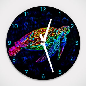 May include: A black clock face with a neon rainbow sea turtle design. The clock numbers are in a light blue color.