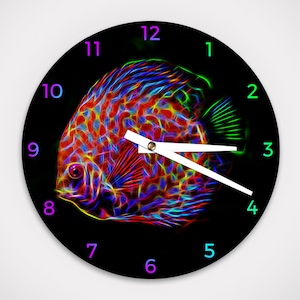 May include: A black clock face with neon colored numbers and a neon colored fish design. The fish is a discus fish with red, orange, yellow, green, and blue colors. The clock hands are white.