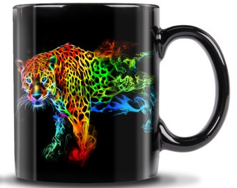 May include: Black ceramic coffee mug with a colorful image of a jaguar with rainbow-colored smoke behind it.