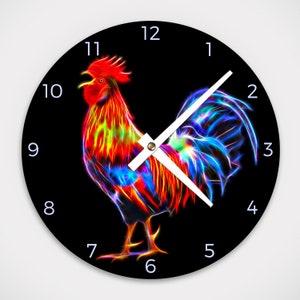 May include: A black clock face with white numbers and hands. The clock face features a colorful rooster with red, yellow, blue, and purple feathers. The rooster is in a dynamic pose with its wings spread out.