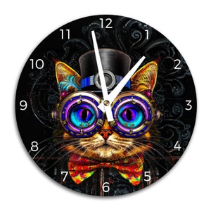 May include: A black and white clock with a steampunk cat wearing a top hat and goggles. The cat's eyes are blue and purple. The clock face has white numbers and hands.