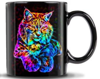 May include: Black ceramic coffee mug with a colorful image of a bobcat. The bobcat is depicted in a vibrant rainbow of colors, with its fur appearing to be made of light.