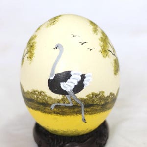 Acrylic Hand painted Running Ostrich on an Authentic Ostrich Egg Shell decor, Bushmen Art by Philip Dokwani. With Carved wood stand.