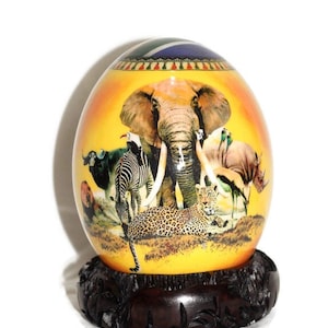 African Big Five Decoupage Shell. Ostrich Egg African Warriors, Map and a South African flag on a yellow /orange background. Christmas Gifts