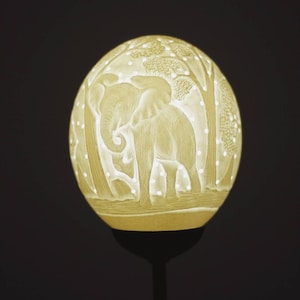Ostrich Egg Fine Art carved Elephant Lampshade. Authentic shell with and tree carvings and Holes. House warming/ office lighting gifts