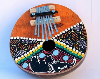 Kalimba Marimba, Mbira African traditional Thumb Piano Music Instrument. Well polished coconut shell and painted wood with seven metal keys